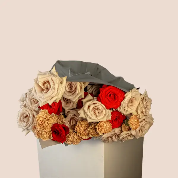 This is an image of our red and sand rose bouquet called Reverse Cowgirl.