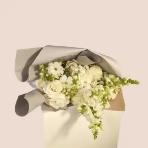 This is the cover photo of our all-white bouquet called Pure Justice.